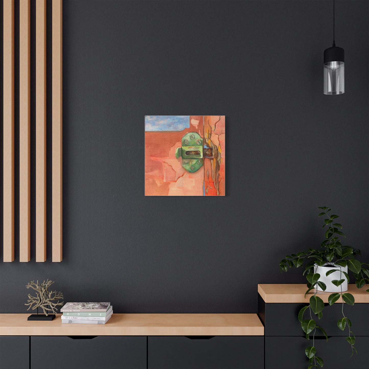 Painting of a window latch set on a dark wall in a modern interior.