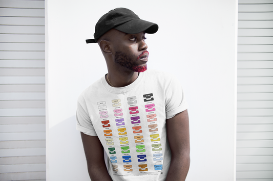 Person wearing a white t-shirt with colourful text design against a white background
