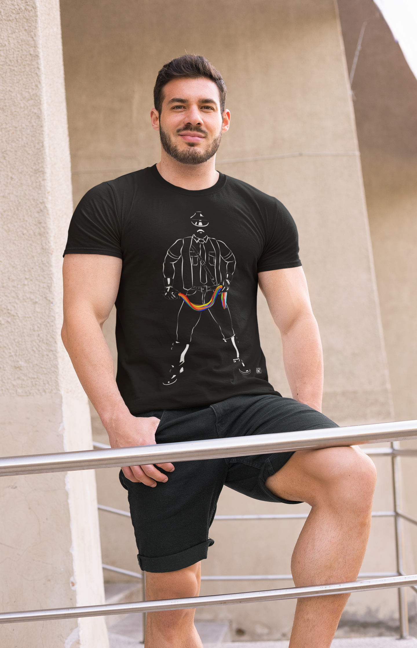 100% Lightweight Cotton Crew-Neck T-Shirt - Graphic Featuring A 'Leatherman Holding A Whip In Pride Rainbow Colours'