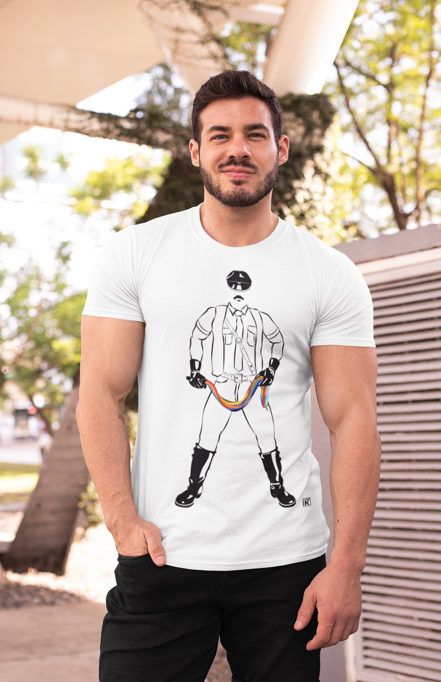 100% Lightweight Cotton Crew-Neck T-Shirt - Graphic Featuring A 'Leatherman Holding A Whip In Pride Rainbow Colours'